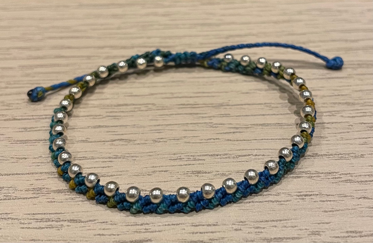 Handmade bracelet with silver colour metal beads