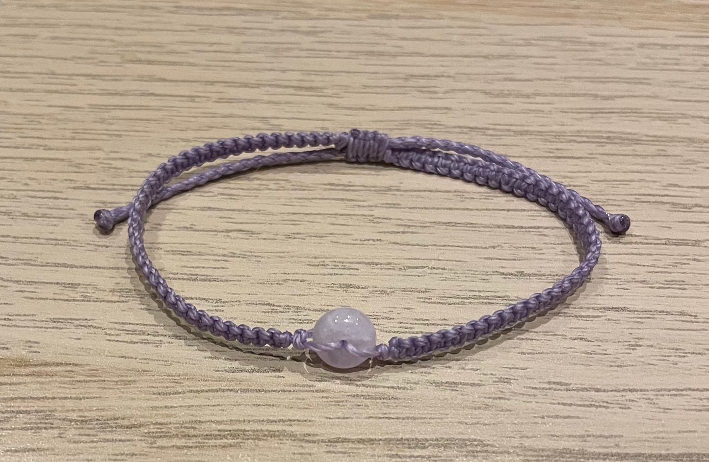 Handmade bracelet with a tiny lavender jade donut