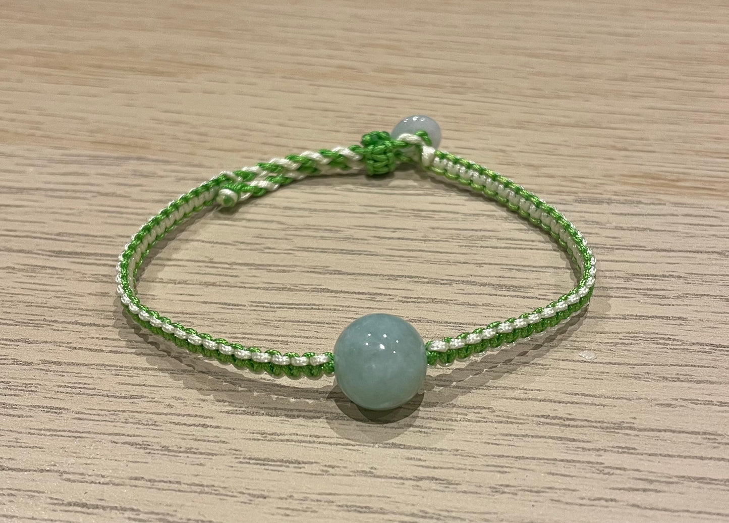 Handmade bracelet with a green jade bead