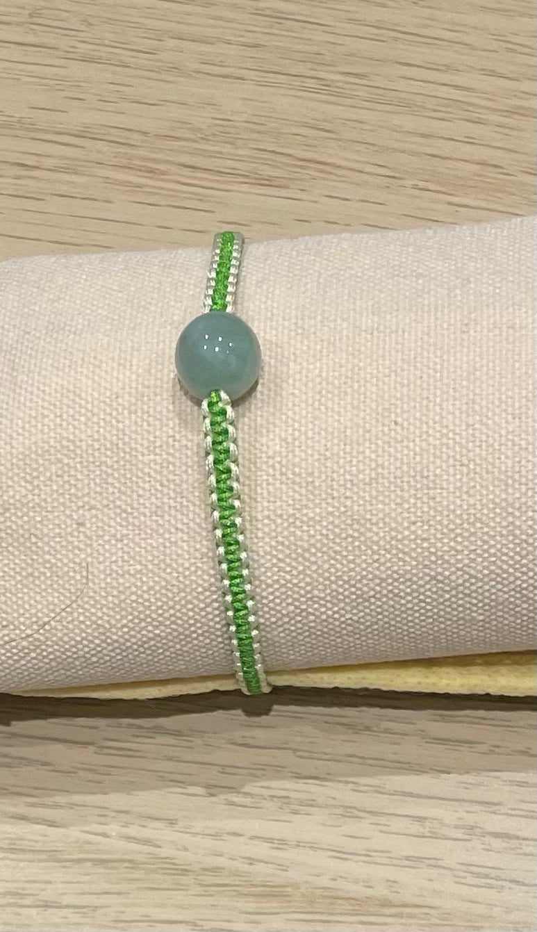 Handmade bracelet with a green jade bead