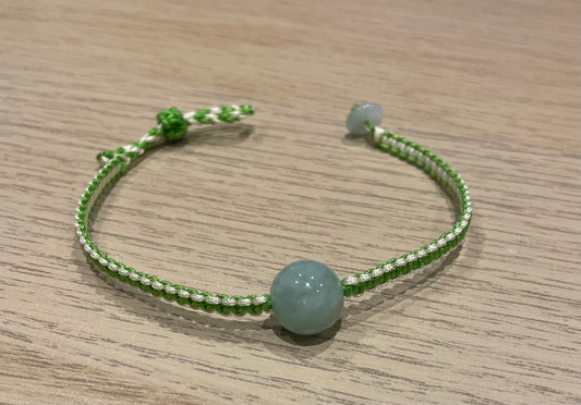 Handmade bracelet with a green jade bead