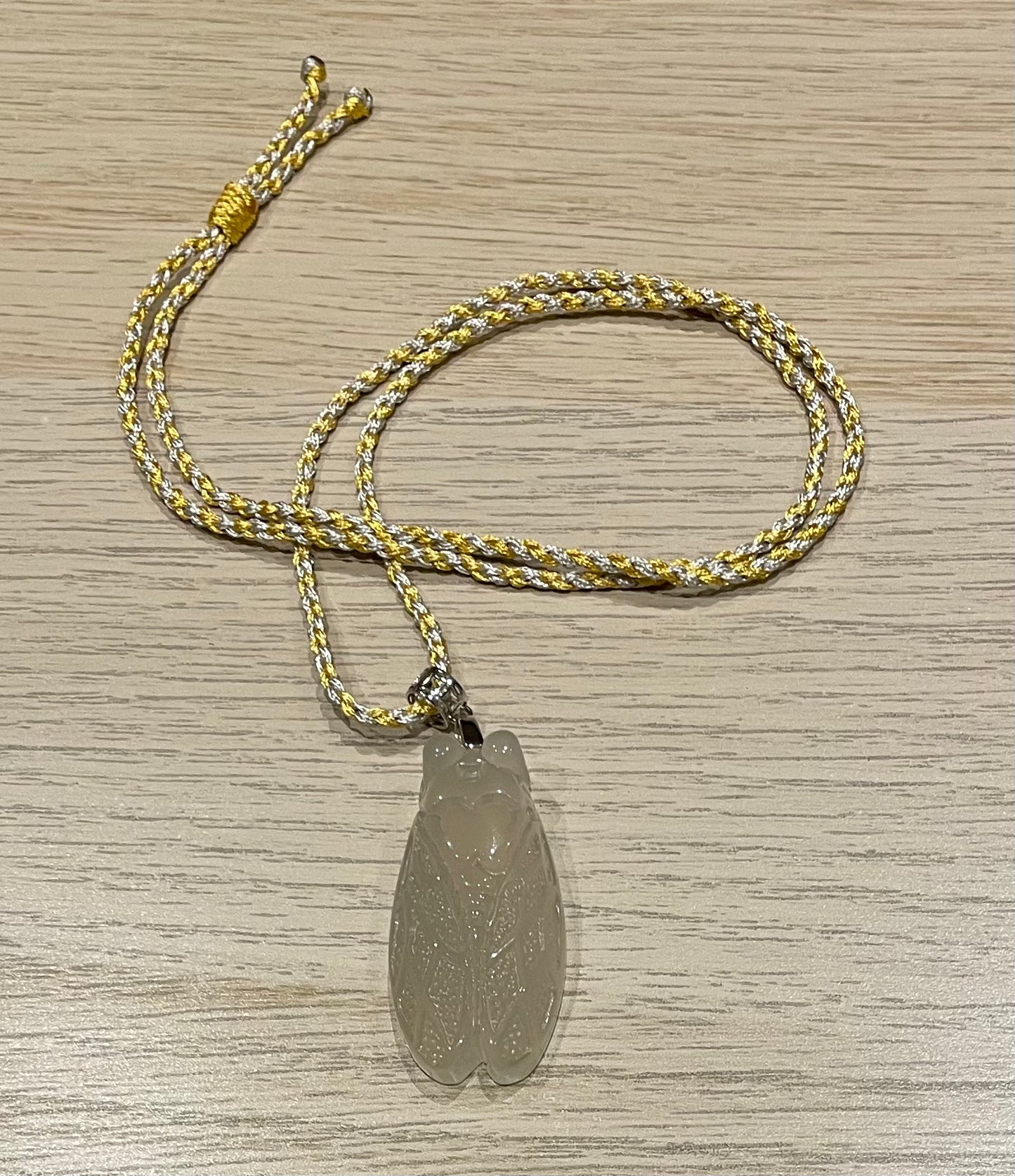 Handmade necklace with a serpentine jade cicada