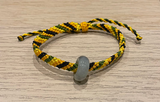 Handmade colourful bracelet with a jade ring