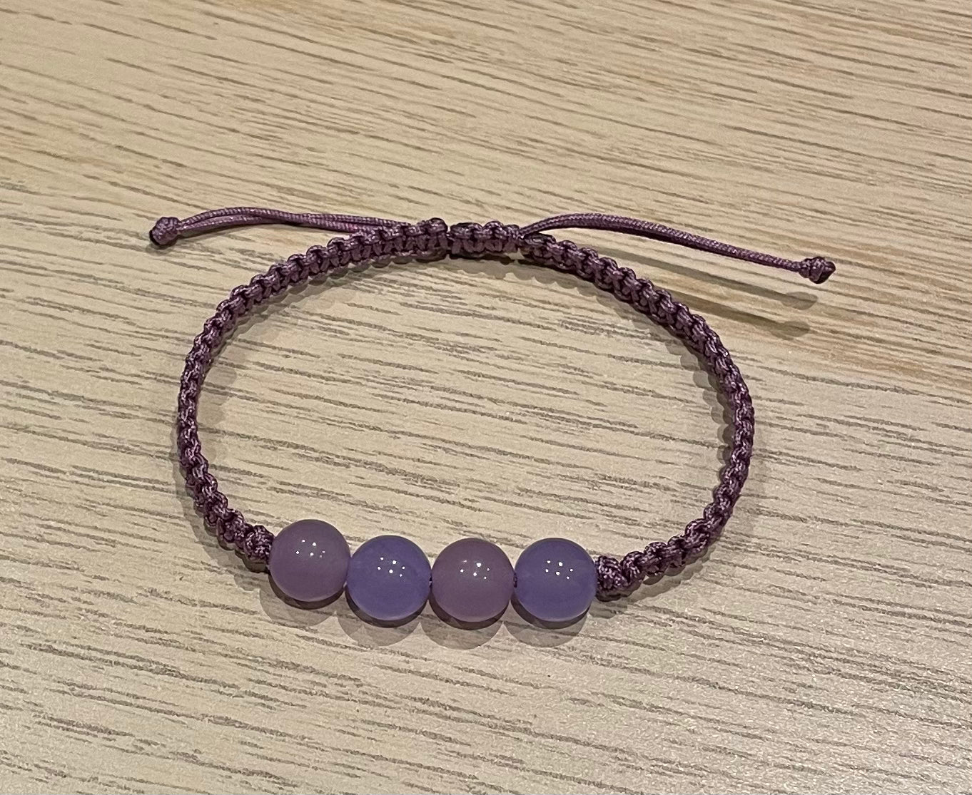 Handmade bracelet with purple chalcedony beads