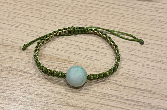 Handmade bracelet with a green jade bead