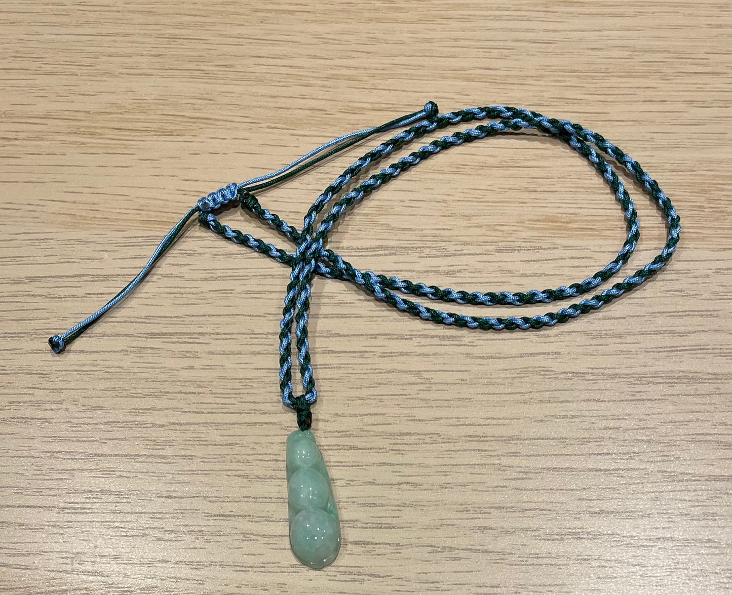 Handmade necklace with a jade snow pea pendant