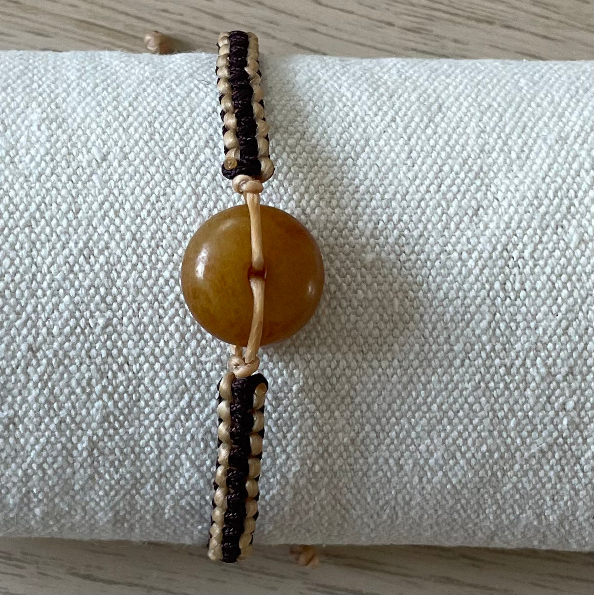 Handmade bracelet with a yellow jade charm