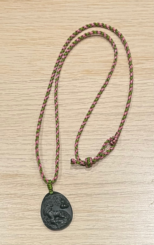 Handmade necklace with a dark green jade tiger pendant