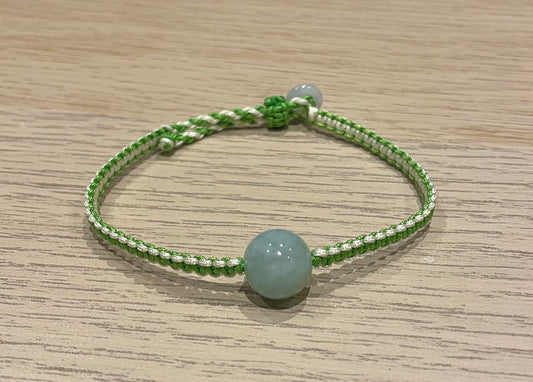 Handmade bracelet with a green jade bead