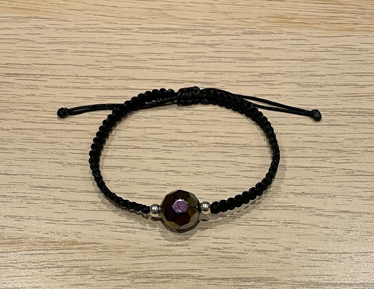 Handmade bracelet with a glass bead charm