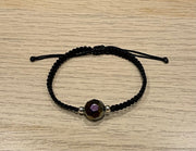 Handmade bracelet with a glass bead charm