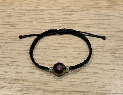 Handmade bracelet with a glass bead charm
