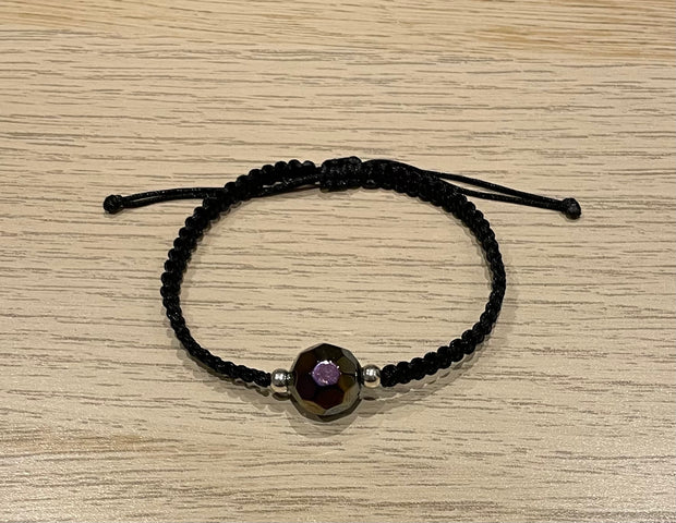 Handmade bracelet with a glass bead charm