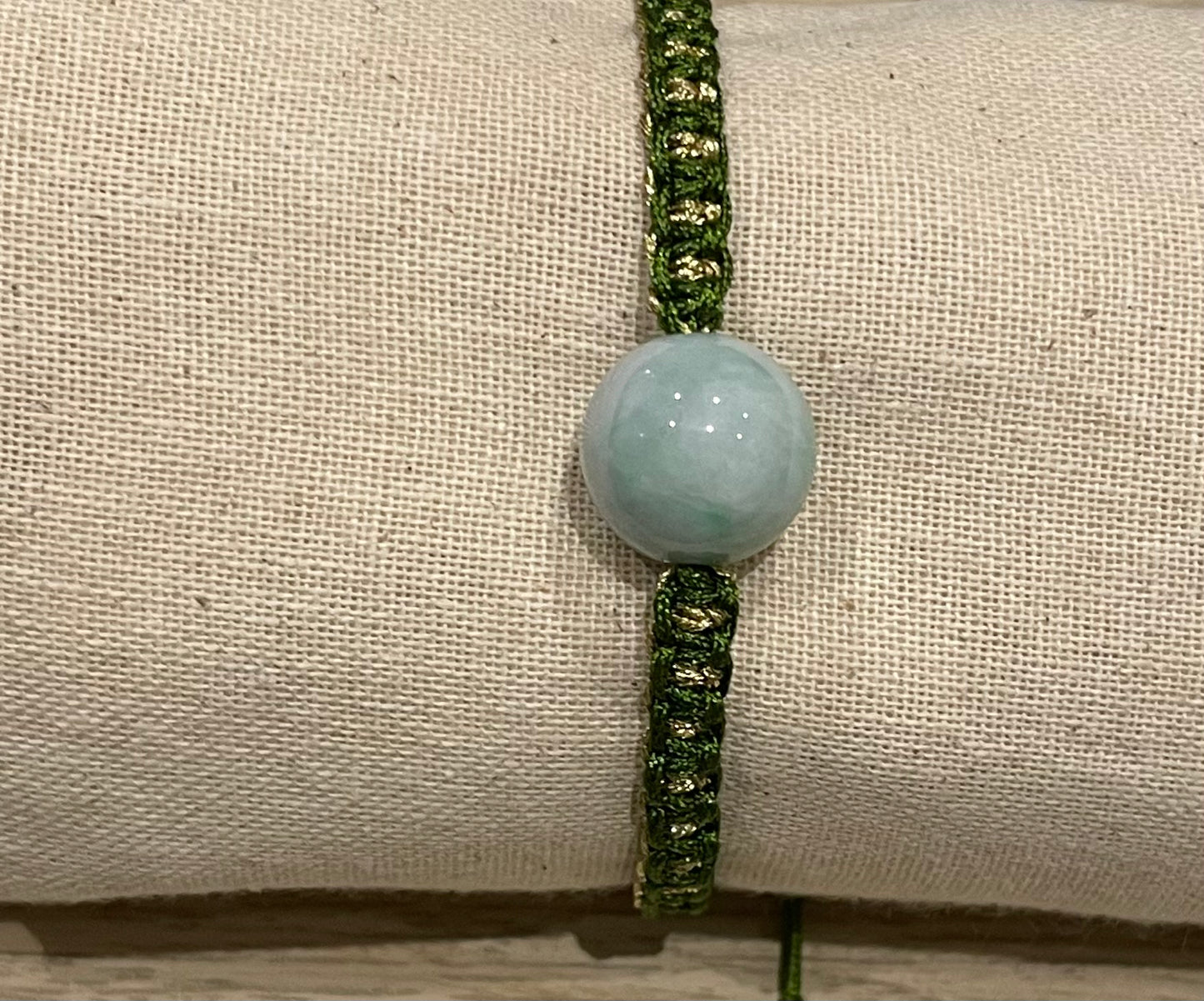 Handmade bracelet with a green jade bead