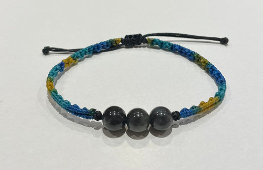 Handmade bracelet with black jade beads and gradient colour waxed string