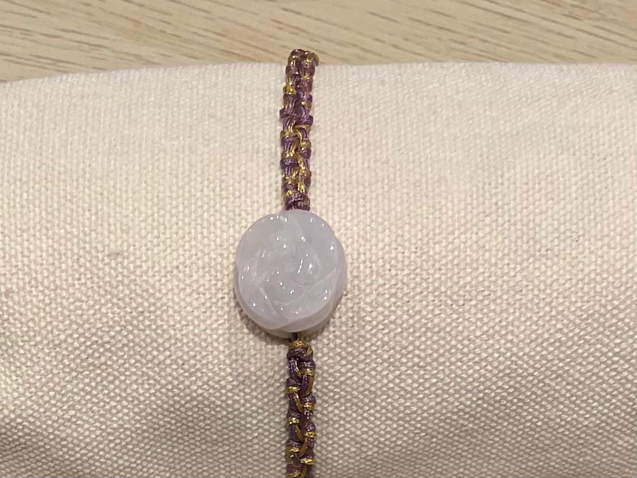 Handmade bracelet with a white jade flower