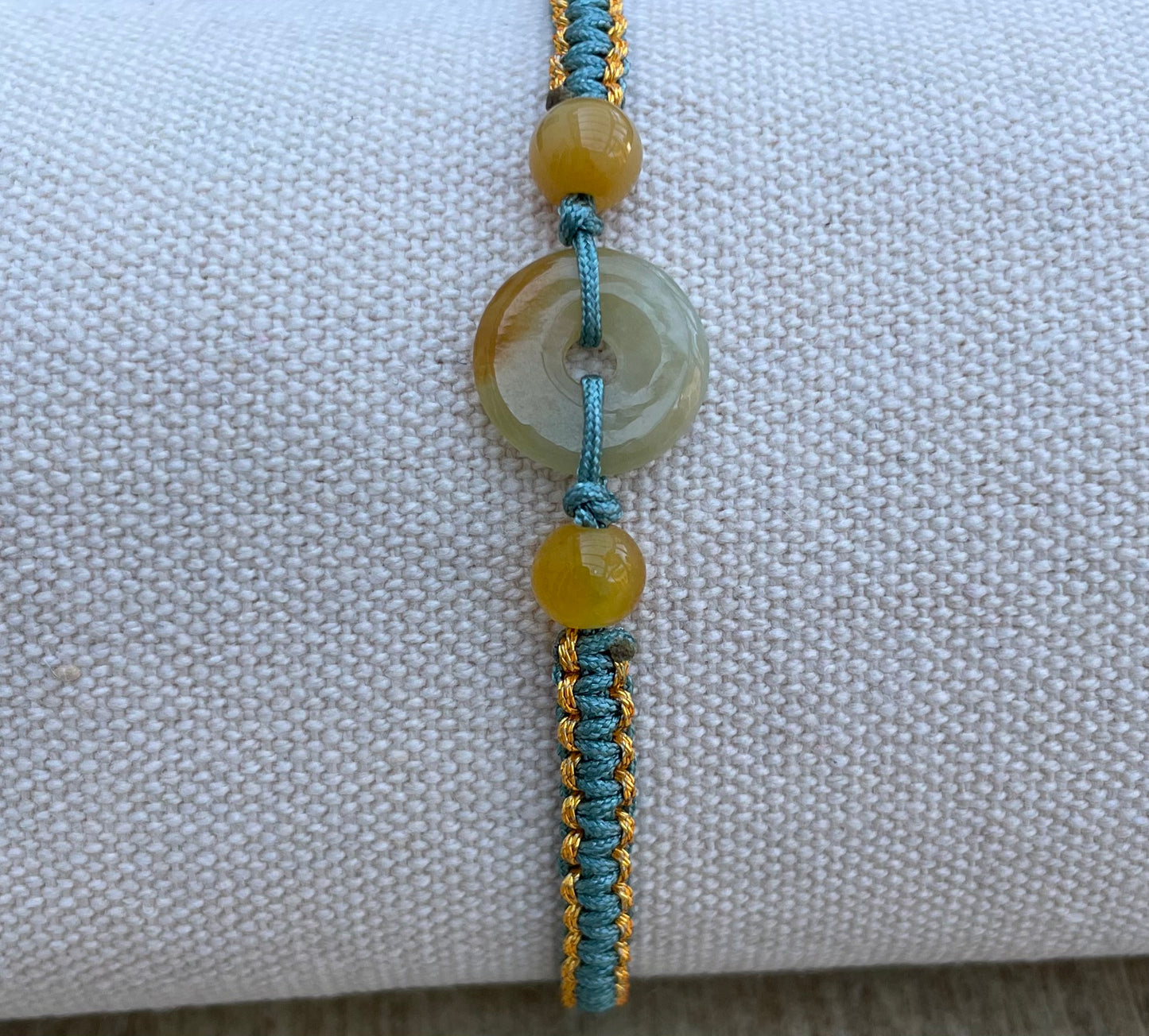 Handmade bracelet with yellow jade donut