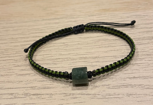 Handmade bracelet with a green jade charm