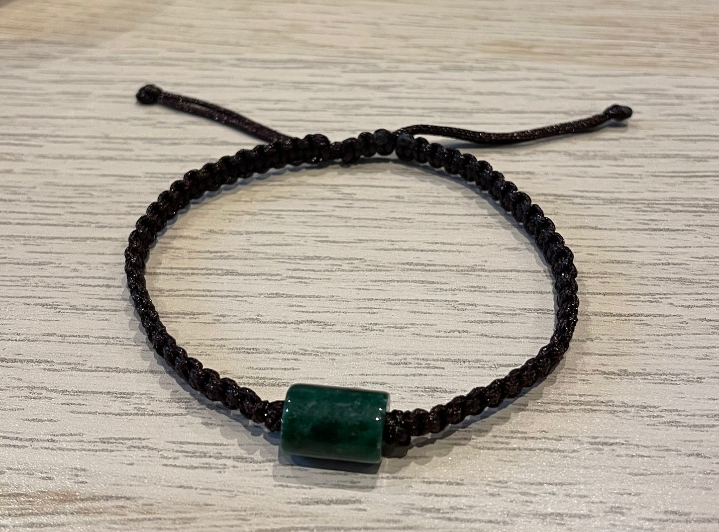 Handmade bracelet with a green jade charm