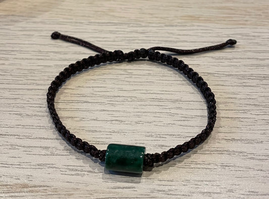 Handmade bracelet with a green jade charm