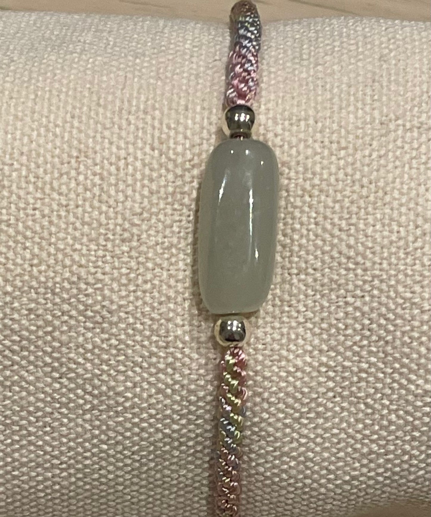 Handmade bracelet with a Hetian jade charm