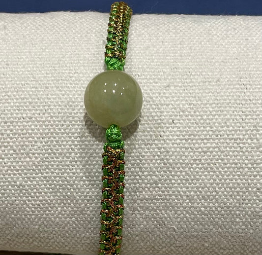 Handmade bracelet with a green jade bead